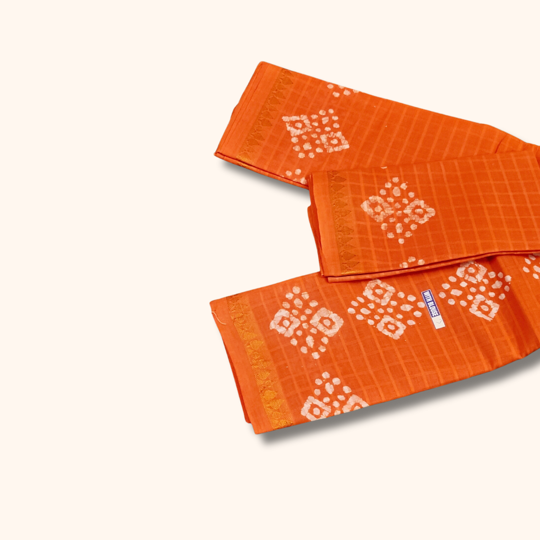 Bright Orange Sungudi Cotton Saree with Traditional White Batik Motifs & Matching Blouse Piece