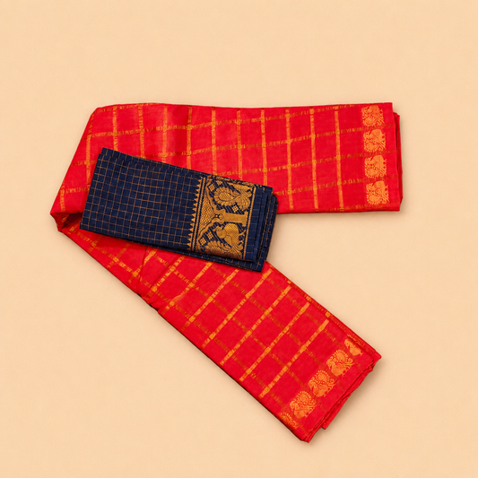 Bright Orange Pavithra Kattam Sungudi Saree with Contrast Navy Blue Blouse
