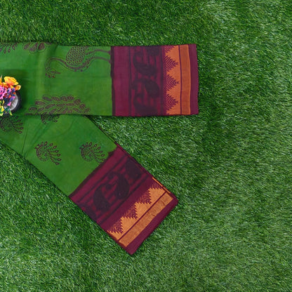 Leaf Green Sungudi Saree with Maroon Peacock Border