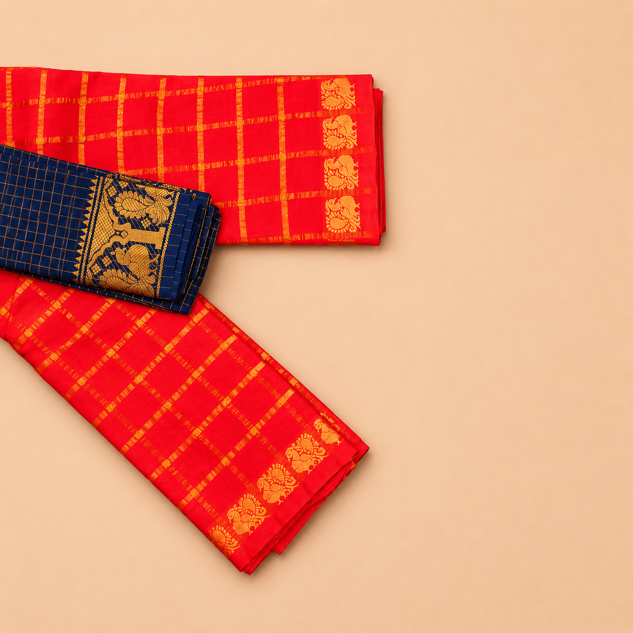 Bright Orange Pavithra Kattam Sungudi Saree with Contrast Navy Blue Blouse