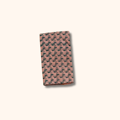 Dusty Pink Sungudi Cotton Saree with Floral Motifs & Dark Green Traditional Border