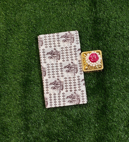 Attractive Off White Cotton Saree with Brown Traditional Prints & Designer Border