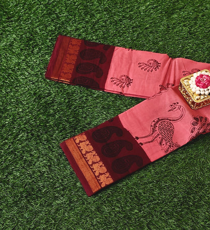 Coral Pink Sungudi Cotton Saree with Maroon Border & Traditional Peacock Prints