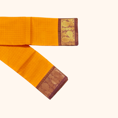 Rich Yellow Chettinad Cotton Saree with purple shade Peacock Border
