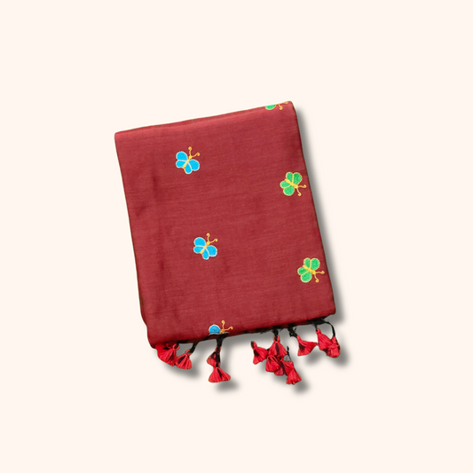 Mulmul Cotton Saree in Maroon with Butterfly Motifs & Tassel Pallu