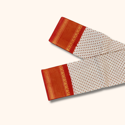 Off-White Cotton Saree with Tiny Floral Print & Orange Gold Zari Border – No Blouse