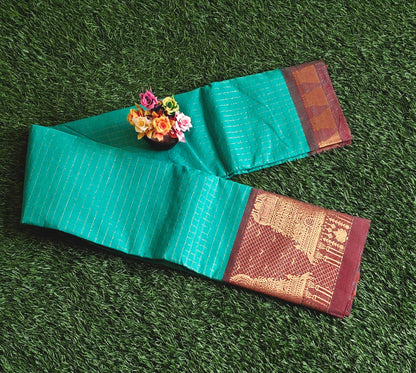 Chettinad Cotton Saree with Meenakshi Gopuram Border – Peacock Green Checks