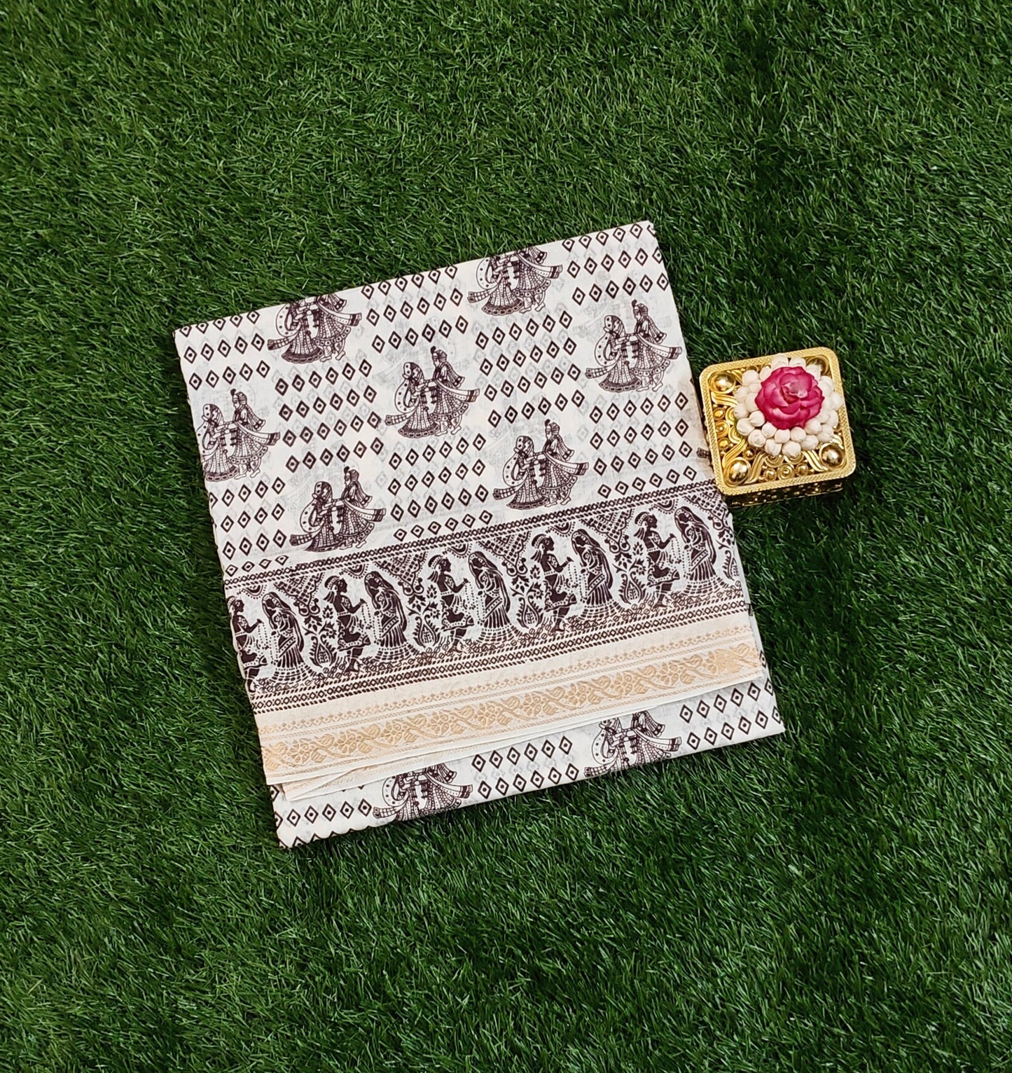 Attractive Off White Cotton Saree with Brown Traditional Prints & Designer Border